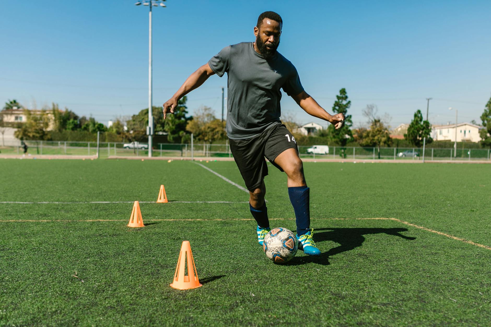 Training Football Dribbling Drill through cones